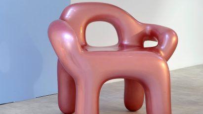 Photo of a pink chrome armchair
