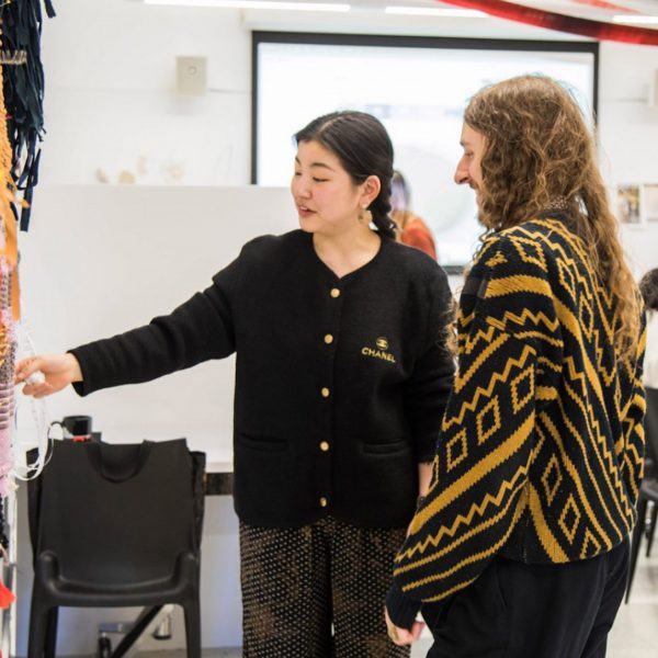 Image of students looking at artwork