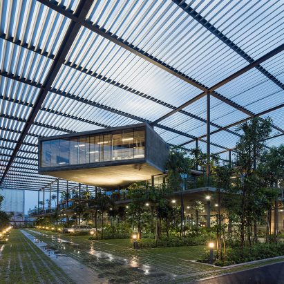 Photo of building with glass ceiling and plants