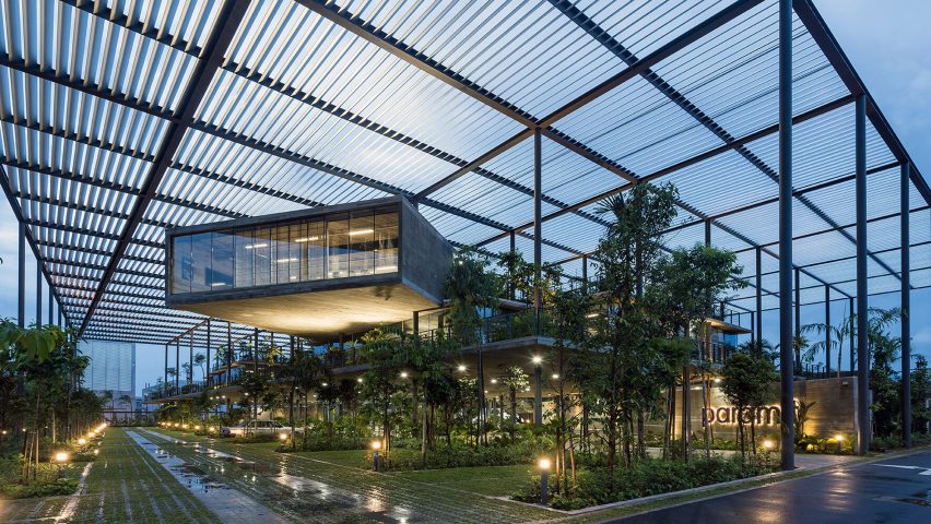 Photo of building with glass ceiling and plants