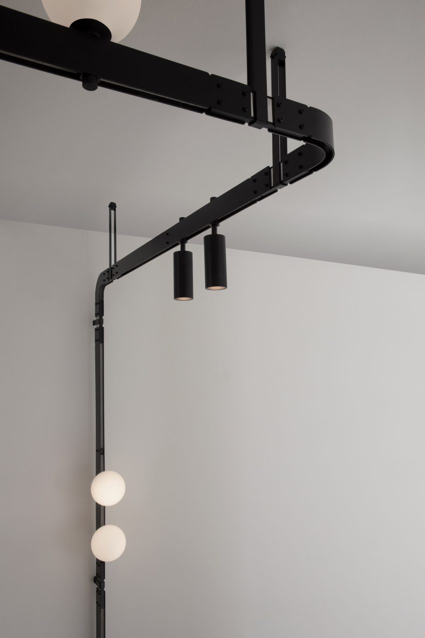 Detail of track lighting with suspension cords and LED spotlights