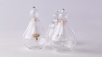 Photograph showing glass flasks with stoppers