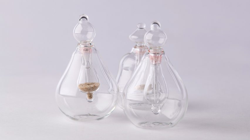 Photograph showing glass flasks with stoppers