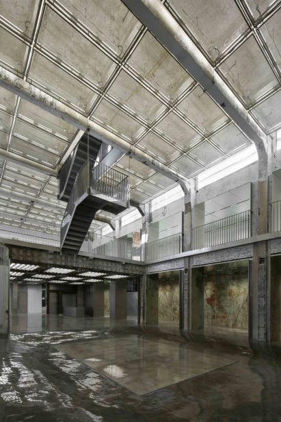 Reflecting pool and floating staircase in multi-brand store in Shanghai designed by Dongqi Design