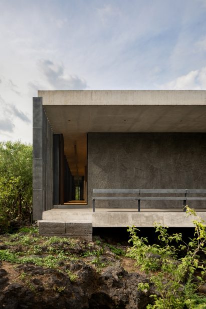 Cantilevered stone building Mauricio Rocha