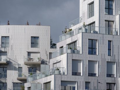 Grey-tiled housing with terraces