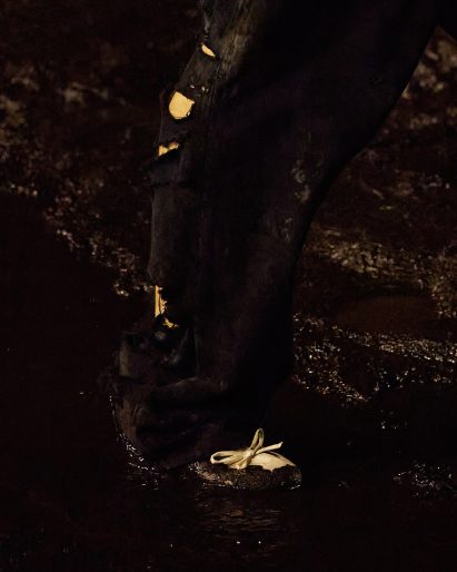Image of mud-covered Balenciaga clothing