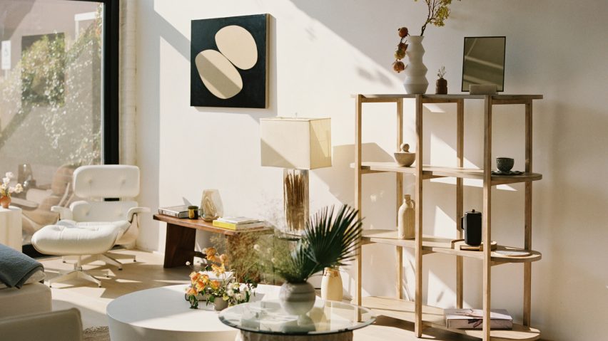 Room with white walls and wooden furniture