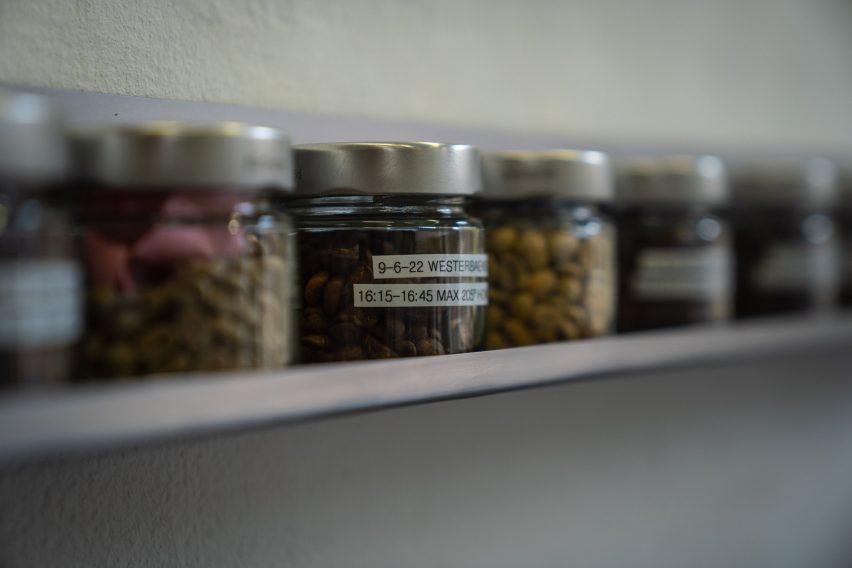 Jars of roasted coffee beans