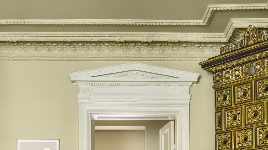 Image of green-painted decorative mouldings