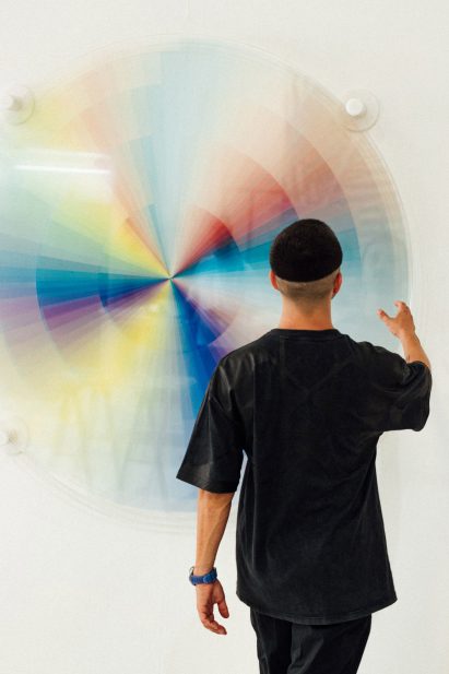Felipe Pantone besides his artwork
