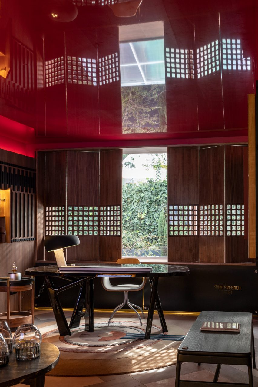 Red ceiling with desk