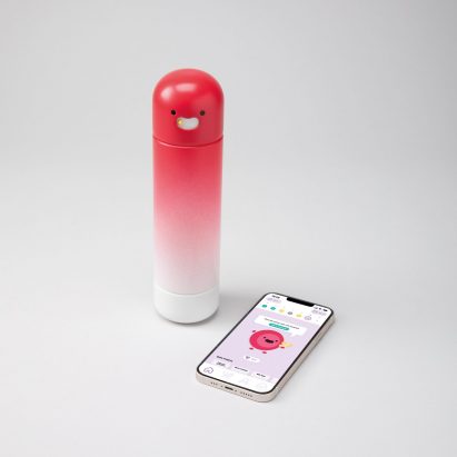 Photograph showing smartphone and water bottle on grey backdropo