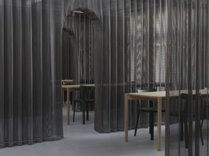 Domino Architects designs a reusable sales showroom with fabric walls