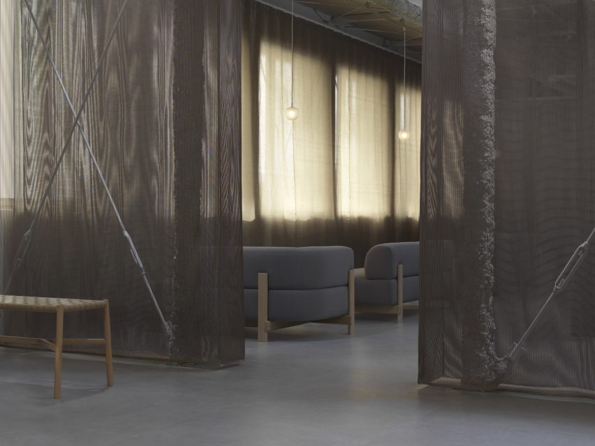 Domino Architects designs a reusable sales showroom with fabric walls