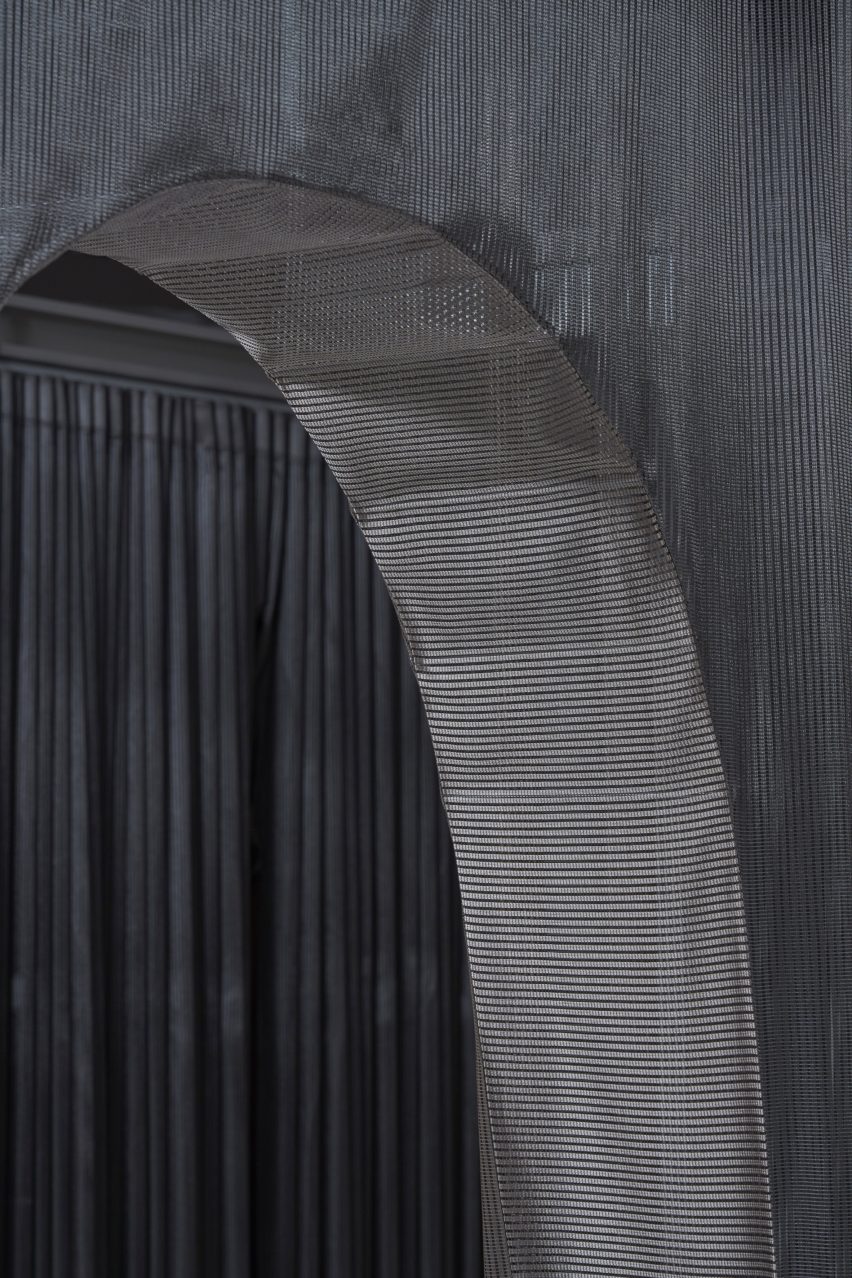 Domino Architects designs a reusable sales showroom with fabric walls