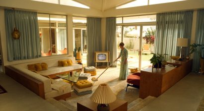 A woman vacuum cleaning