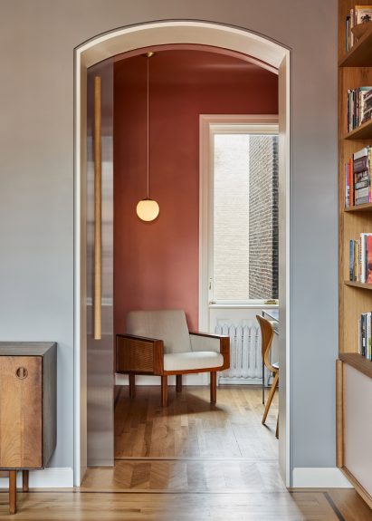 Small office with sienna walls