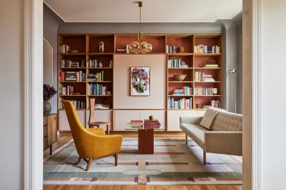 Living room with full storage wall