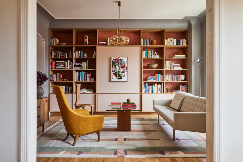 Living room with full storage wall