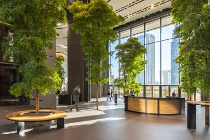 Interior image of the tree-filled Urban Room at Varso Tower