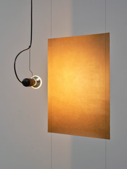 One paper sheet illuminated as part of the Paperwork installation