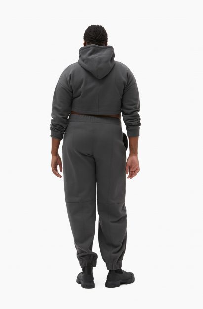 A model wearing a hoody and jogging bottoms