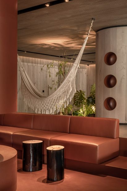 Hammock in wood-lined Grand Emily Hotel Lobby