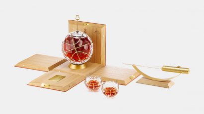Bottle and basketball-shaped glasses
