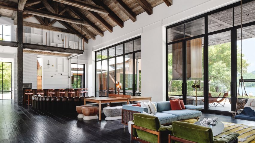 Living room with high ceilings and large windows
