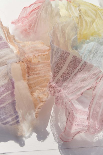 Close up of Sh(r)ine containers in different colours