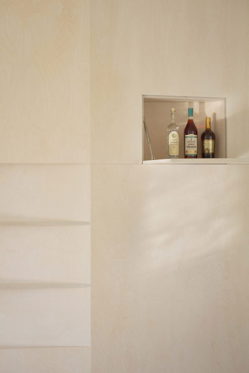 Tel Aviv apartment by Laila Architecture features plywood storage "iceberg"