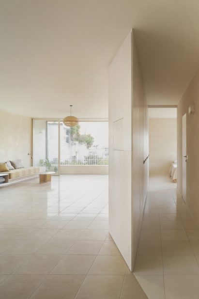 Tel Aviv apartment by Laila Architecture features plywood storage "iceberg"