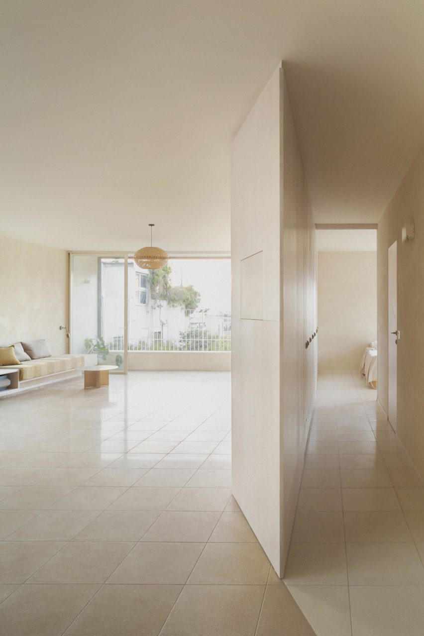 Tel Aviv apartment by Laila Architecture features plywood storage "iceberg"