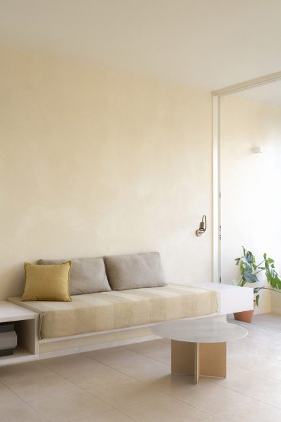 Living room inside Iceberg apartment by Laila Architecture