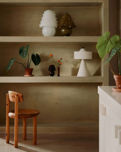 Items displayed on plastered shelves