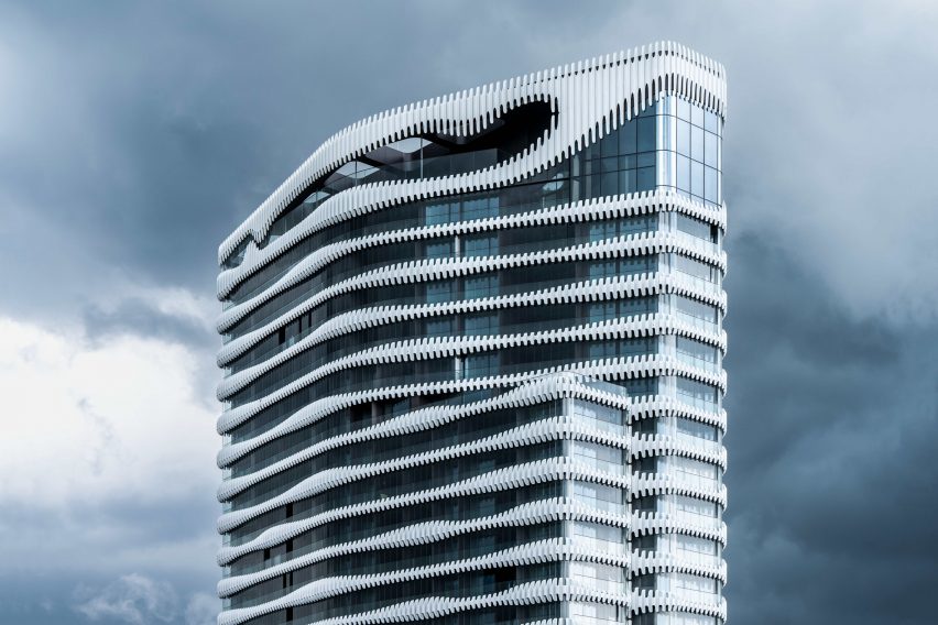 J Mayer H wraps RKM 740 Tower in wavy metal cladding