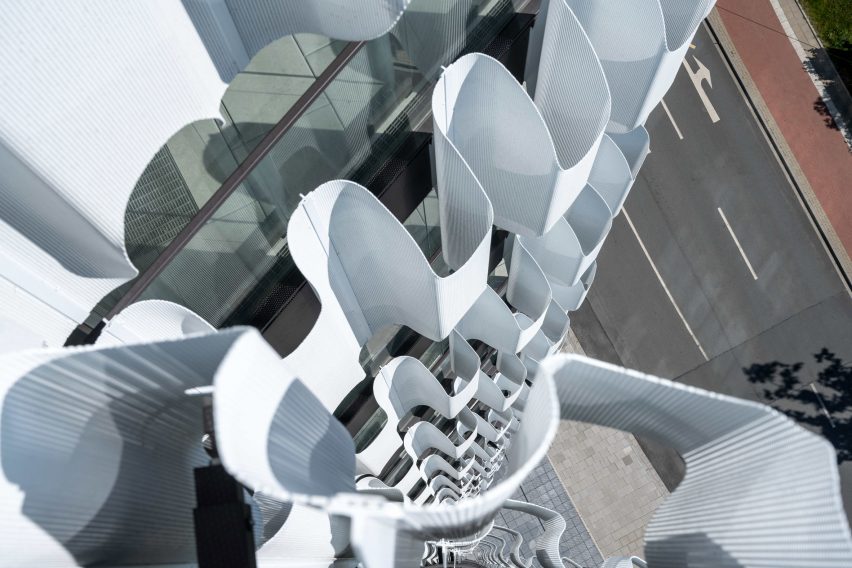 J Mayer H wraps RKM 740 Tower in wavy metal cladding