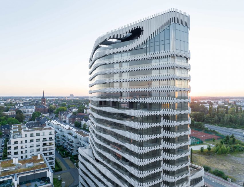 J Mayer H wraps RKM 740 Tower in wavy metal cladding