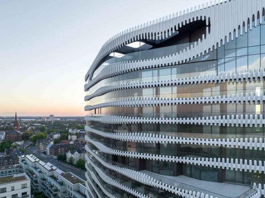J Mayer H wraps RKM 740 Tower in wavy metal cladding