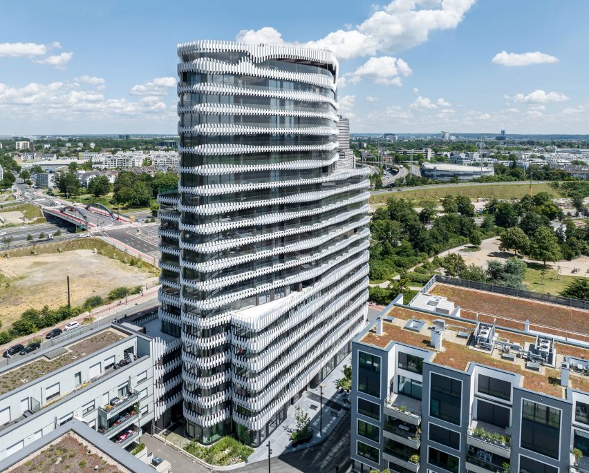 J Mayer H wraps RKM 740 Tower in wavy metal cladding