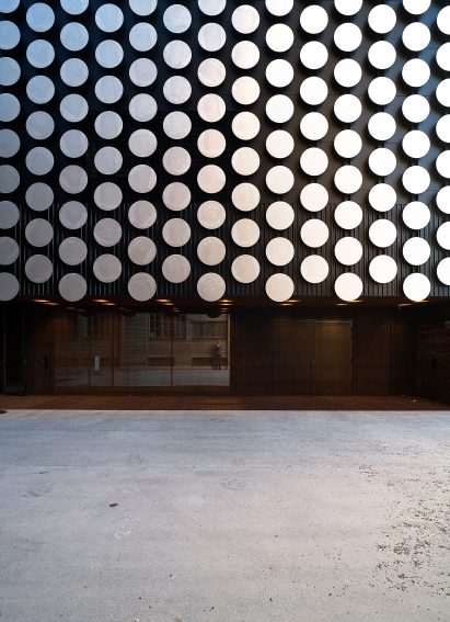 Detail image of the circular metal cladding panels