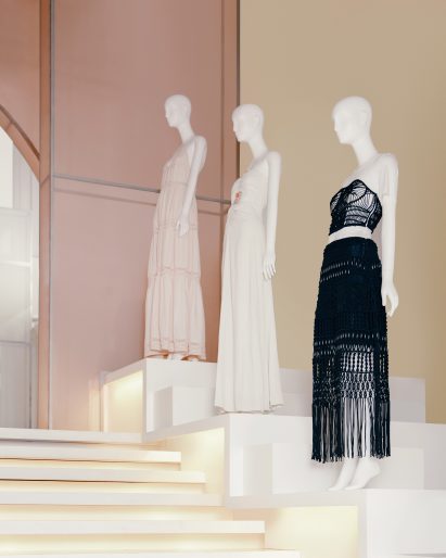 Staircase flanked by mannequins