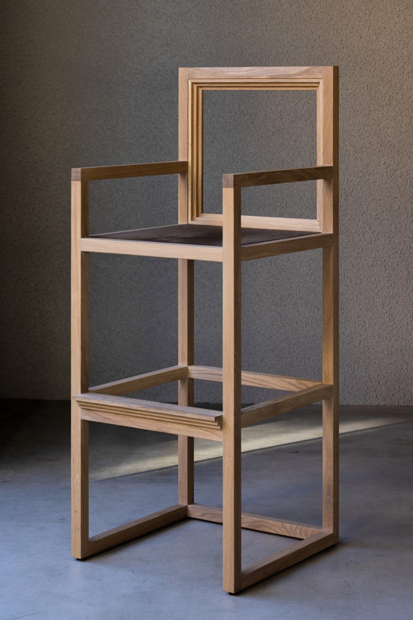 high wooden stool with arms