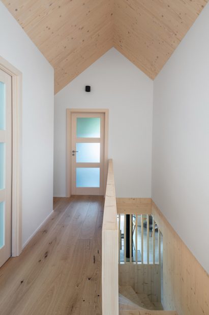 Interior image of the upper level of the wooden cabin