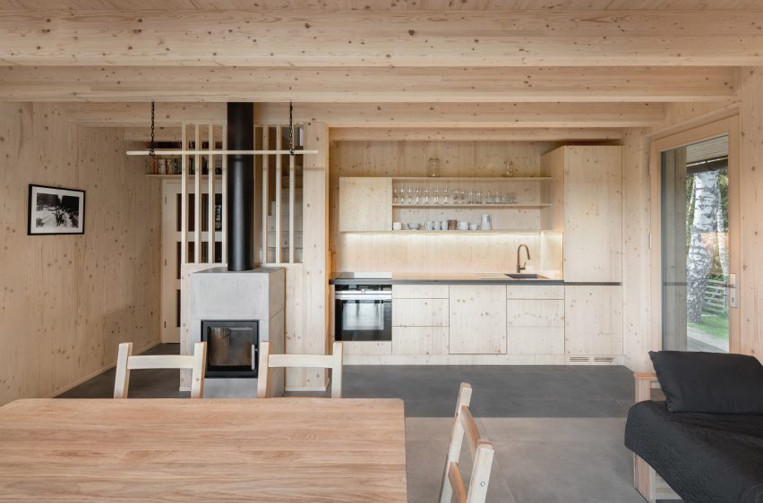 Les Archinautes and 3AE create timber cabin overlooking lake in Czech Republic