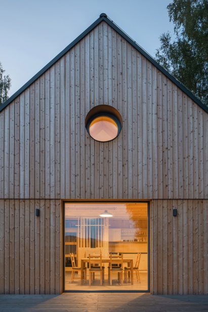 Exterior image of the facade of Lipno Lakeside Cabin with views of the interior