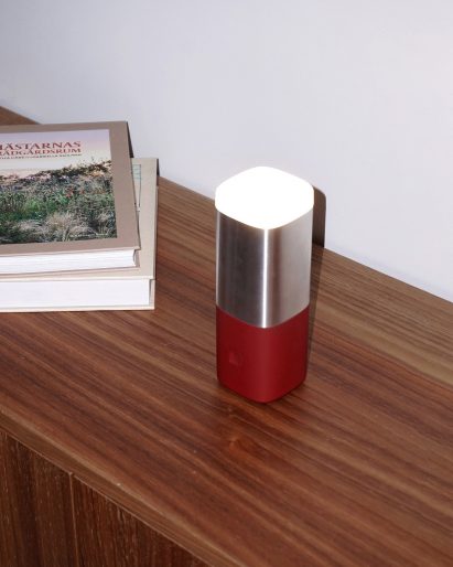 Lighthouse light with red base by Jacob Alm Andersson