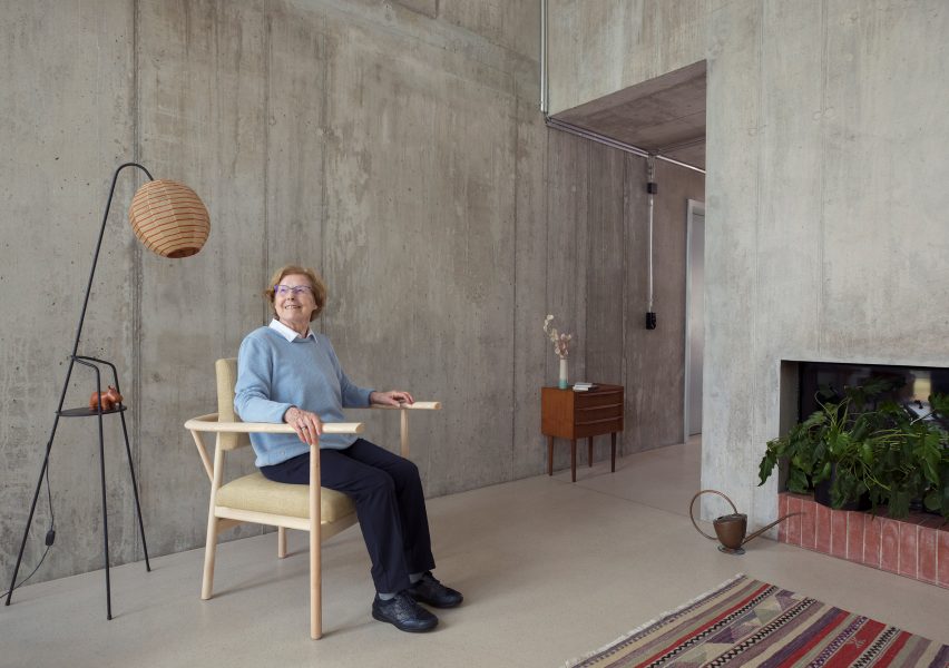 Woman sitting on Lotte armchair