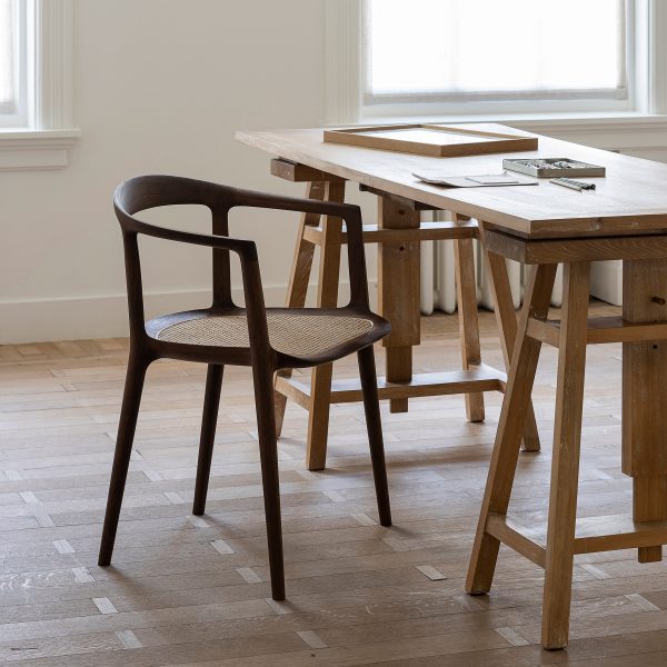 Wooden chair in a room at a wooden desk